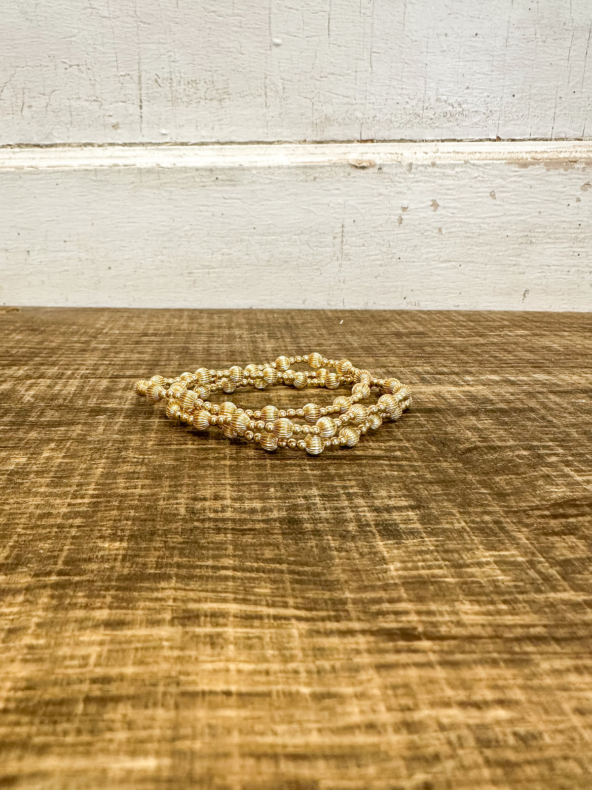 Dignity Sincerity Pattern 6mm Bead Bracelet - Gold