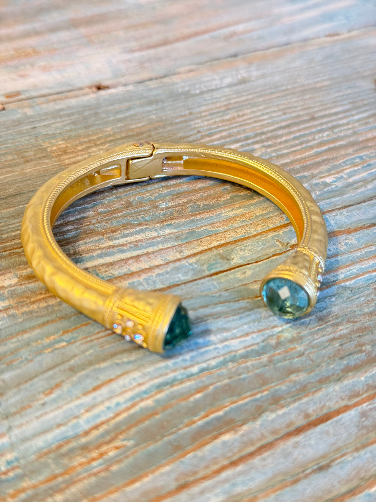 Gold Cuff with Blue Stone Ends